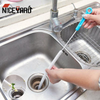 Щетка для удаления волос на кухонной раковине