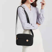 斜跨包女轻便防泼水尼龙布包休闲出行通勤包牛津布百搭简约单肩包