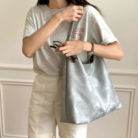 大容量托特包包女2024新款韩版简约百搭ins水桶包时尚通勤单肩包