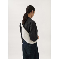 牛角包2024新款小众质感真皮通勤大容量单肩斜挎腰包饺子包可颂包