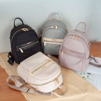 背包女双肩包牛津布新款百搭时尚小背包旅行学生纯色质感小书包女