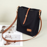 斜跨包高级感水桶包2024新款百搭尼龙布简约百搭大容量休闲包包女