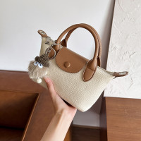 纳兰杜包包女士2024新款斜挎小包女小众手提包单肩饺子包真皮女包