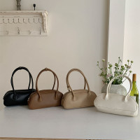 小众时尚单肩手提女包2024新款韩版马鞍包高级感复古腋下法棍包批