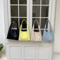 时尚简约单肩手提女包2024新款韩版高级感百搭休闲通勤子母水桶包