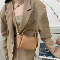 真皮元宝包mini菜篮子春夏系列设计师款手提斜挎迷你小手机包