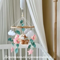 Музыкальный мобиль в кроватку