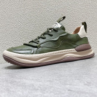 春季男鞋2023新款真皮男士休閒鞋設計師小眾歪頭小醜鞋低幫滑板鞋子