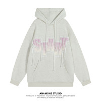 ANAMONE 設計感小眾流蘇字母連帽運動衫女春秋套頭寬鬆休閒插兜上衣