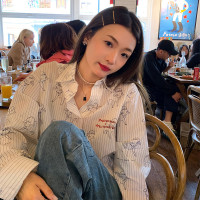 落落狷介 襯衫上衣女白色條紋2023年春夏新款設計感小眾寬鬆襯衫