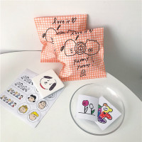 简约韩风ins 橘色格子卡通抽象画小纸袋包装袋礼品袋糖果可爱摆拍