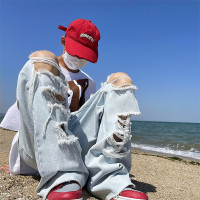 淺藍色膝蓋大破洞牛仔褲男款夏季薄款美式高街vibe褲子毛邊闊腿褲